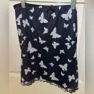 Black mini skirt with white butterflies